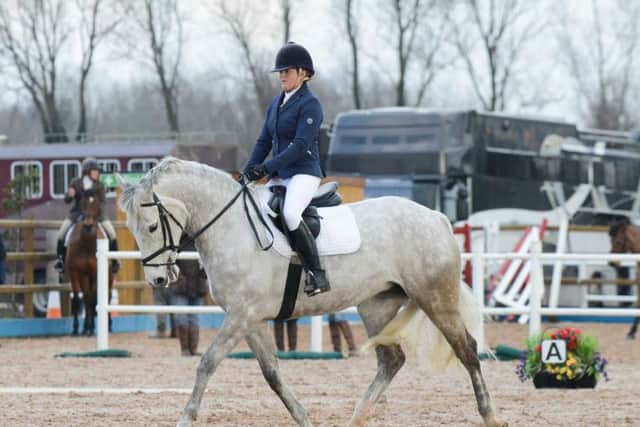 Kathryn Graham and Flutter Bye took first place in the novice section
