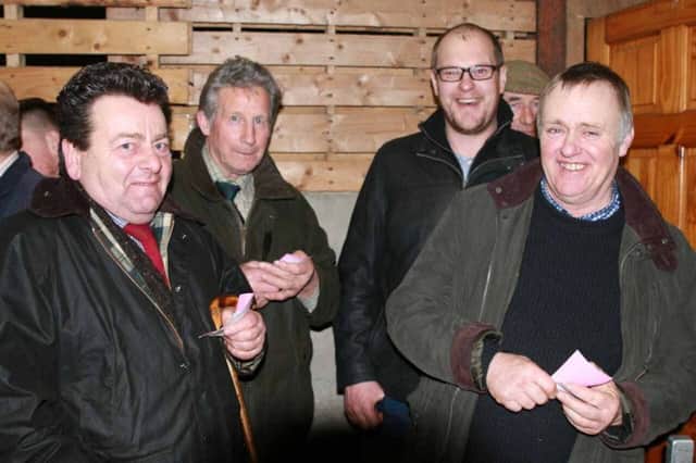 John Harkin, Sandy Patterson, Perthshire, David Morrison and John Finlay, Ayrshire, discuss sheep at the stockjudging pictured at the Loughash charity stockjudging evening. PICTURE: JULIE LOUGHERY/MCAULEY MULTIMEDIA