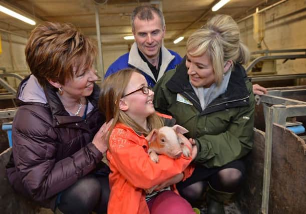 Lynn Anderson, 10 year old Faye Anderson, DARD Minister Michelle O'Neill and pig farmer Gary Anderson. The FFKS is the next stage of the Farm Business Improvement Scheme (FBIS), which is being delivered under the 2014-2020 Rural Development Programme.