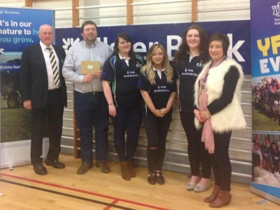 The winning team with Ulster bank representative and YFCU president Roberta Simmons