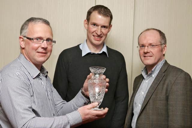 John Egerton (left) winner of Fermanagh Grassland Club's Houston Trophy, with Robert Graham, Chairman, and  William Johnston, Secretary.