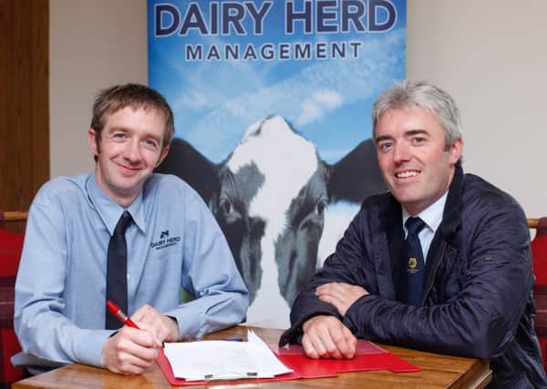 Discussing the agenda for Holstein NI's forthcoming AGM are sponsor Gary Watson, Dairy Herd Management, with outgoing chairman Stuart Smith. Photograph: Columba O'Hare