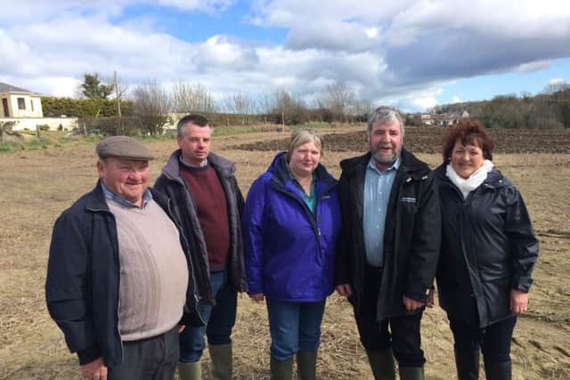Martin Gill (left) Acting Chairman of Listooder Ploughing Society with his sister Katheen Lyons (right), Rodney Brown, John & Vivienne Lyons of JL Enginnering