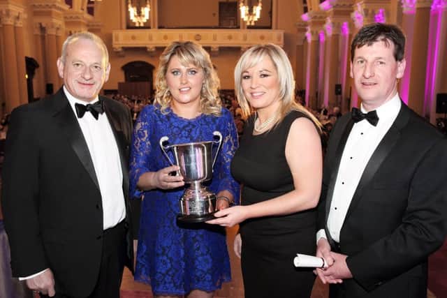 This year the Cuthbert Trophy was awarded to the North East Armagh Group for retaining the highest percentage of their members in 2015. Pictured receiving the trophy is Lawson Burnett and Avril Macauley with Minister Michelle ONeill and Wesley Aston, UFU Chief Executive.