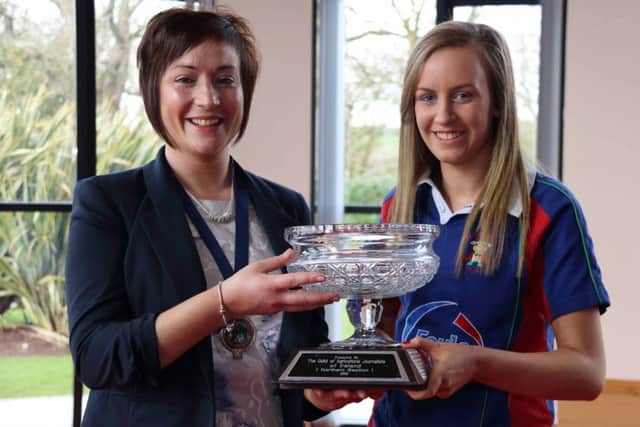 Julie Ann Giles from Seskinore YFC who was awarded Top Club PRO is pictured with Roberta Simmons, YFCU President.