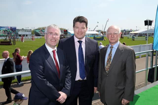 Richard Donnan, left, Ulster Bank Head of Northern Ireland at the Ulster Bank lunch in the Balmoral Show main marquee with Neal Kelly, centre, Director of Fresh Foods at Henderson Group, the speaker at the event, and Sir Howard Davies, Chairman of Ulster Banks parent company, RBS.