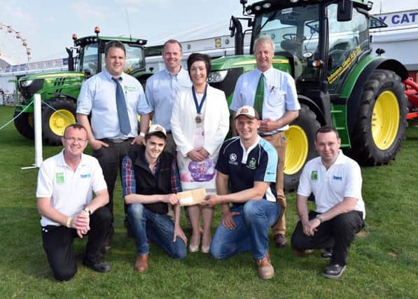 Pictured receiving their first place prize in the YFCU Machinery Handling competition are County Down members Keith Dixon from Spa YFC and Jonny Crawford from Newtownards YFC with YFCU President, Roberta Simmons; Paul Kelly, HSENI and Gethin Jones from Sponsor Johnston Gilpin & Co. Also pictured are representatives from Johnston Gilpin & Co and HSENI.