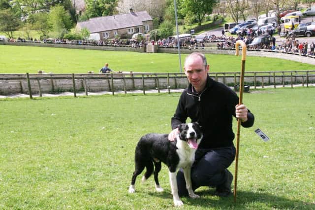 Northern Irelands Padraig Doherty with Cap, his new world record price 14,100gns sheep dog at Skipton.
