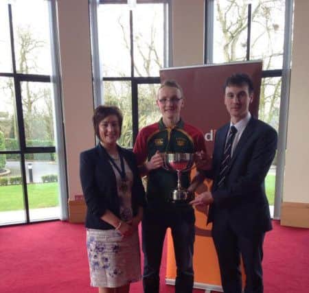 Matthew Wilson receiving his award for 'YFCU Junior Member of the year'.