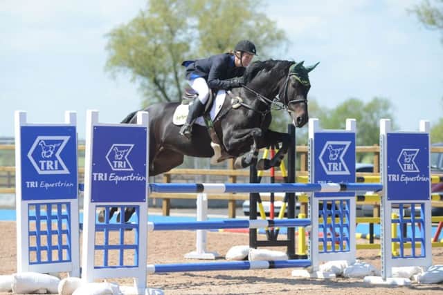 Emma Jackson riding Silken Allure, winners of the 1.20m
