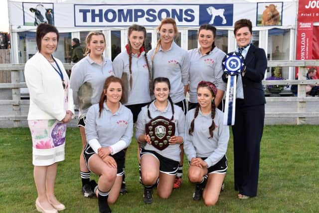 Winners of the 2016 female Tug of War competition, BMWR YFC, pictured with Carolyn Wilson from sponsor John Thompson & Sons Ltd and YFCU President Roberta Simmons.