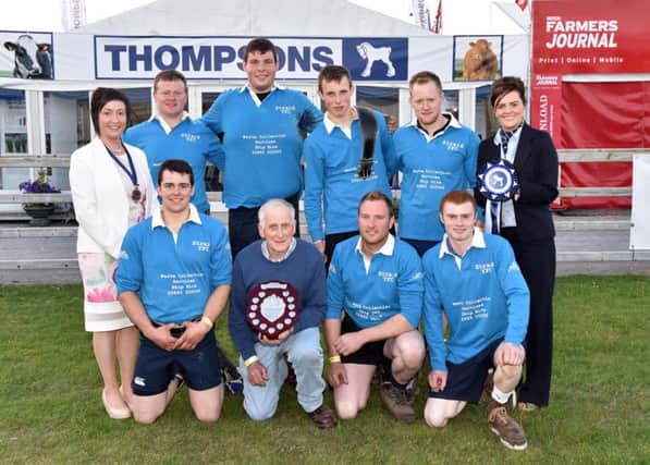 Winners of the 2016 Novice Tug of War competition, Straid YFC 1, pictured with Carolyn Wilson from sponsor John Thompson & Sons Ltd and YFCU President Roberta Simmons.