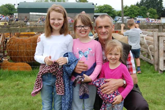 Enjoying their day out at Ballymoney Show: Gerard Kelly, from Ballycastle with granddaughters Amy, Corina and Effie Davidson, from Armoy