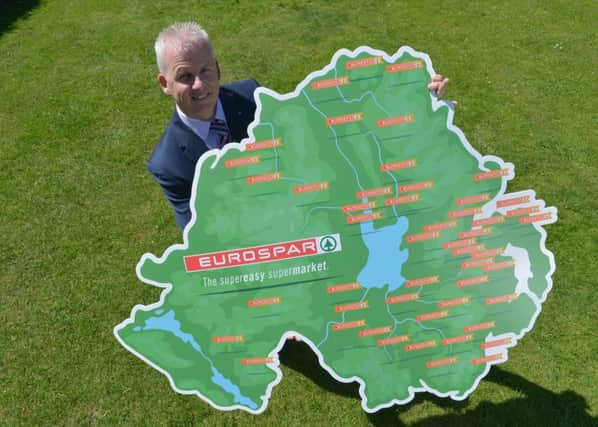 Paddy Doody, Sales and Marketing Director for the Henderson Group celebrates reaching the 50th store milestone for its EUROSPAR brand in Northern Ireland, months ahead of schedule. 
The group plans to open five more stores before the end of 2016.