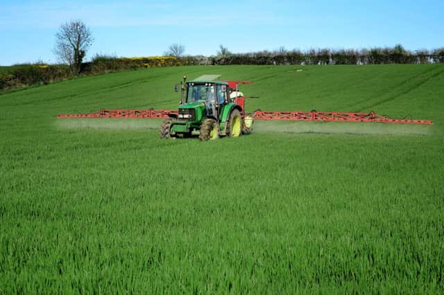 Spraying cereals at UFU deputy president Barclay Bell's farm near Rathfriland. Picture: Cliff Donaldson