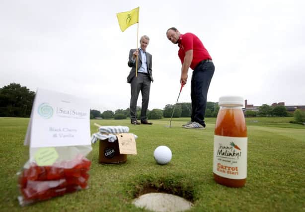 Pictured at the launch of the Ulster Bank Food Festival which features in this summerÃ¢Â¬"s Northern Ireland Open, are Terry Robb (left) Ulster Bank Regional Manager, Private Banking and up and coming young golfer Jordan Hood from Galgorm. 
The Ulster Bank Food Festival, hosted at Galgorm Castle during the NI Open from 27th Ã¢Â¬ 31st July will provide businesses such as those from the Entrepreneurial Spark Hatchery in Belfast and Artisan NI the chance to set-up shop for samples and sales at the purpose-built marquee. 
The Northern Ireland Open in partnership with Ulster Bank begins with Pro Am Day on Wednesday 27th July with the tournament running from Thursday 28 to Sunday 31st July at Galgorm Castle. Tickets for the NI Open are free and can be secured by registering online at www.niopen.golf.
