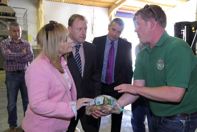 Agriculture minister Michelle McIlveen visiting William Orr's potato farm at Crossgar during Open Farm Weekend. Picture: Cliff Donaldson
