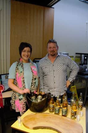 Andrew Boyd from Kilmegan Cider discussing his produce with YFCU President, Roberta Simmons.