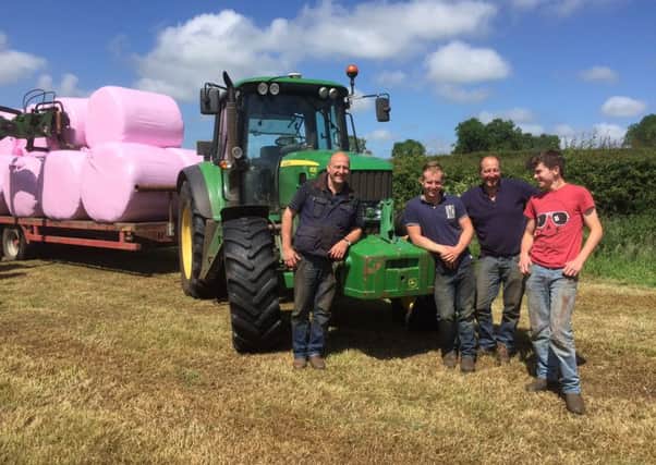 MAKING good silage wrapped in pink for a very good cause on the family dairy farm near Armoy, Co Antrim were, from left, Andrew McNeill, Robert Wilkinson, Keith and Thomas McNeill.
 Every roll of Volac pink Topwrap silage film sold generates Â£3 for Breast Cancer Now, a charity supporting research at over 30 centres including QUB.
 Just as important pink bales serve as a reminder that every wife, mother and daughter needs to attend when offered NHS breast screening health checks