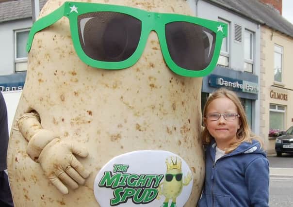 Eight year old Leah Ward, from Comber, had a quick chat with the Mighty Spud, at this year's Comber Potato Festival
