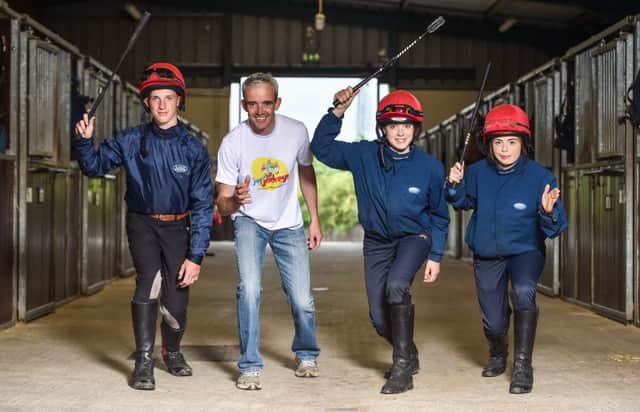 Ruby Walsh with apprentice jockeys, from left, Cian Walsh, from Donadea, Co Kildare, Nessa O'Brien, from Nenagh, Co Tipperary, and Lisa Marie Owens, from Kilmead, Co Kildare, in attendance at the Jog for Jockeys 5km and 10km launch at R.A.C.E., Curragh House, in Kildare Town, Co Kildare. PICTURE: Cody Glenn/Sportsfile