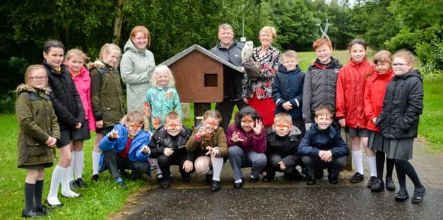 The Mayor Cllr Audrey Wales MBE is shown here with one of the local owls that may benefit from the nesting boxes that have been installed at Eden Allotment Gardens Carrickfergus, Diamond Jubilee Wood Whitehead and Ecos Nature Park Ballymena.