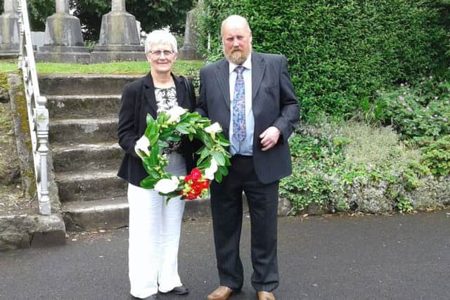 Miriam and Mercer Ward with the wreath they received at Sunday's Service