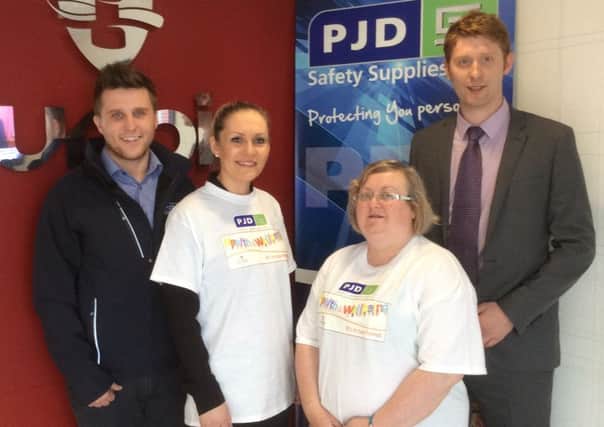 PJD Safety Supplies has helped Dunbia launch their Employee Health & Wellbeing Programme.  Pictured (l o r) are Aaron Lockhart Head of Sales & Financial Services, PJD Safety Supplies, Lisa Hand, Group Purchasing Manager Dunbia, Joy McFarland, Group Health & Safety Manager Dunbia and Daryl Coote, Operations Director PJD Supplies.