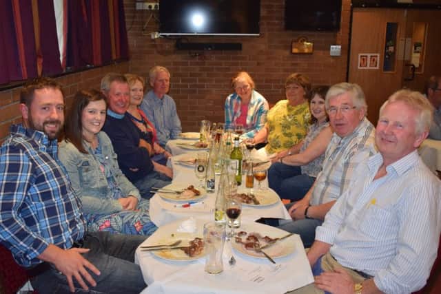 Branch members and friends enjoying the charity barbecue in aid of Rural Support