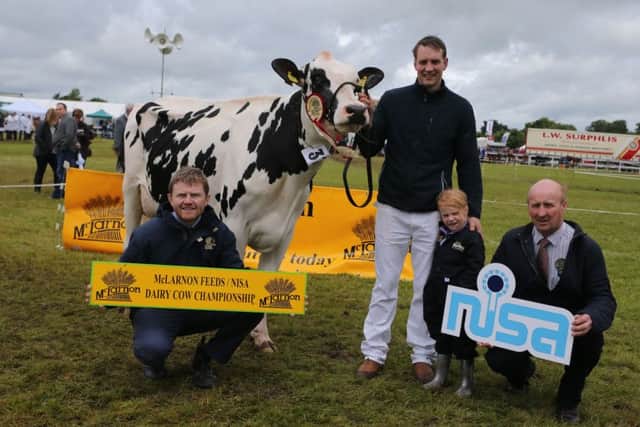 Omagh qualifier for the 2016 McLarnon Feeds/NISA Dairy Cow Championship was Cornagrally Gold Adele 4, owned by Norman & James Morton, Armagh.  Congratulating James & Katie Morton on their success is David Mawhinney (McLarnon Feeds) and Robert Dick (NISA Chairman).