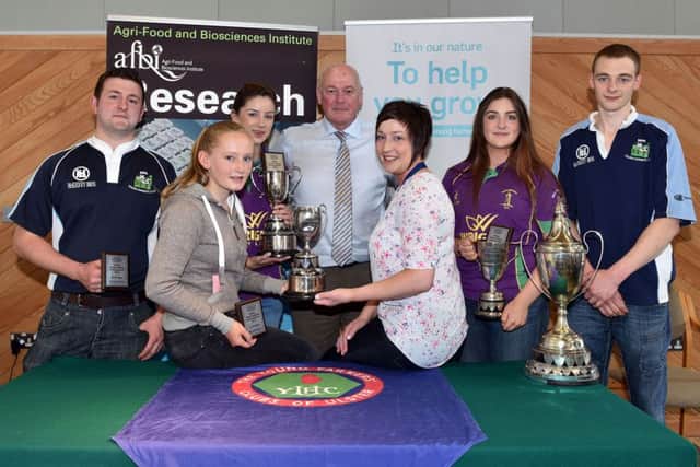 Some of the winners from the stock judging sheep finals. Pictured left to right are David Dodd, first in the 25-30 age category; Danielle Connolly, first in the 14-16 age category; Sara Robinson, first in the 18-21 age category; Michael Stewart, agri lending manager from sponsor Ulster Bank; YFCU president Roberta Simmons; Sara Townley, first in the 18-20 age category and Jimmy Carlisle, first in the 21-25 age category