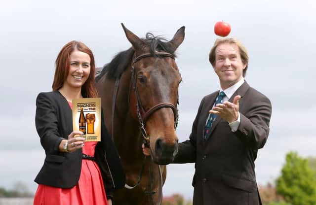 Julia Galbraith, Magners Brand Manager, joins Mike Todd, Down Royals General Manager, to mark this Fridays Magners Race Evening (22 July) at Down Royal Racecourse