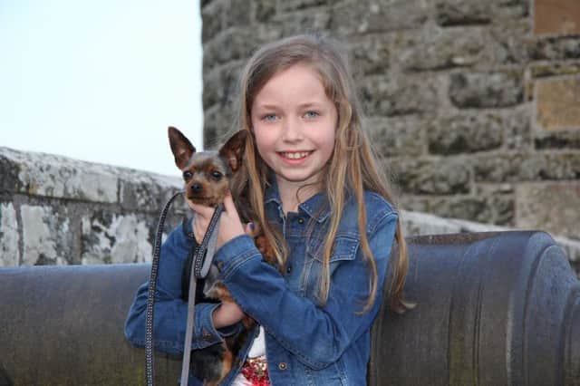 Pet show competitor Eva Walker, Randalstown, with her dog Tilly.. Picture: Julie Hazelton