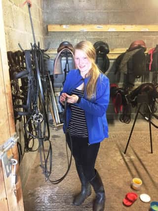Natasha Carlisle pictured on work placement at Lodge Equine Stables, Richill.