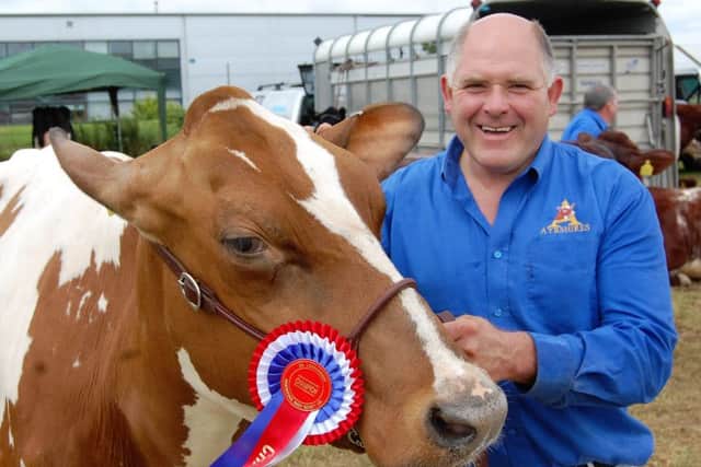 Iain Mclean, from Bushmills, with Marleycote Sea Lilly, the dairy champion at Limavady Show.