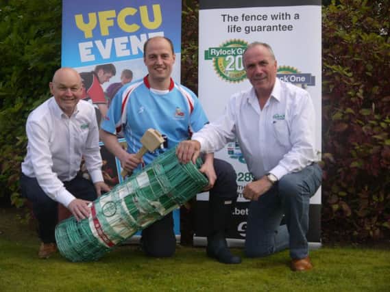 Pictured launching this year's YFCU fencing competition which will be held at the NI Ploughing Championship on Saturday, August 20, is YFCU Vice President David Oliver, Dungiven YFC; (left) Paul Bennington from sponsor Ward and Boyd, and (right) Colin Boyd from sponsor Ward and Boyd.
