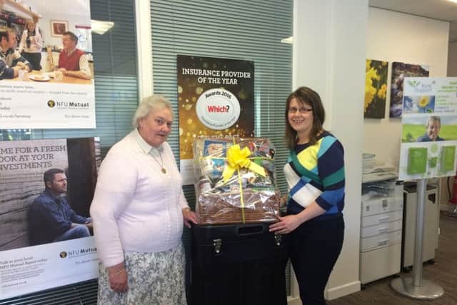 Mrs Violet Little being presented the M&S hamper she won at Clogher Valley Show by Alison Donaldson Group Manager