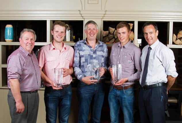 The McLean family, Malcolm, Andrew and Jordan, from the Relough Herd, Donaghmore, were congratulated on winning Holstein NI's Herds Inspection Competition by judge Mark Logan, Bangor; and sponsor Cormac McKervey, Ulster Bank. Picture: David Devennie Photography