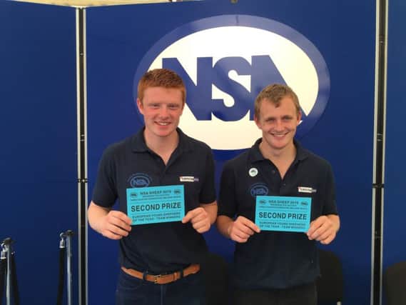 Iain Wilson and Russell Smyth proudly show off their achievements
