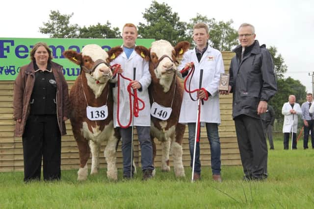 The 2016 Ivomec Super Simmental Pair of the Year winners were Lisglass Fabulous and Lisglass Felicity bred by Leslie and Christopher Weatherup, Balllyclare. Pictured at the presentation are judge Bridget Borlase, Hertfordshire; handlers Christopher Weatherup and Conor Loane; and sponsor Philip Clarke, Merial Animal Health. Picture: Julie Hazelton