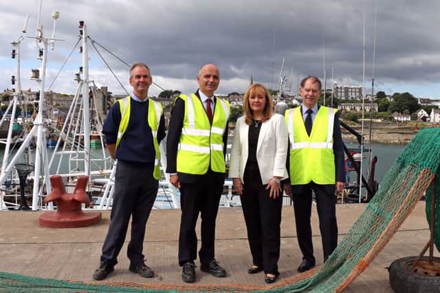 Fisheries Minister Michelle McIlveen visited Ardglass harbour to view DAERA supported investments and discuss plans for further development. The Minister also announced that the European Maritime and Fisheries Fund (EMFF) will open shortly, adding that she was fully aware of the benefits the fund can deliver to the local industry and wider fishing community. Pictured (left-right) are; John Smyth, Ardglass Harbour Master, Kevin Quigley, Chief Executive of NI Fisheries Harbour Association (NIFHA), Minister Michelle McIlveen and Terry Jarvis, Chair of NIFHA.