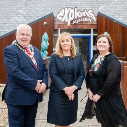 Agriculture, Environment and Rural Affairs Minister Michelle McIlveen (centre) pictured outside the refurbished Exploris Aquarium in Portaferry with Deputy Mayor of Ards and North Down Bill Keery and Exploris General Manager Ann Moreland