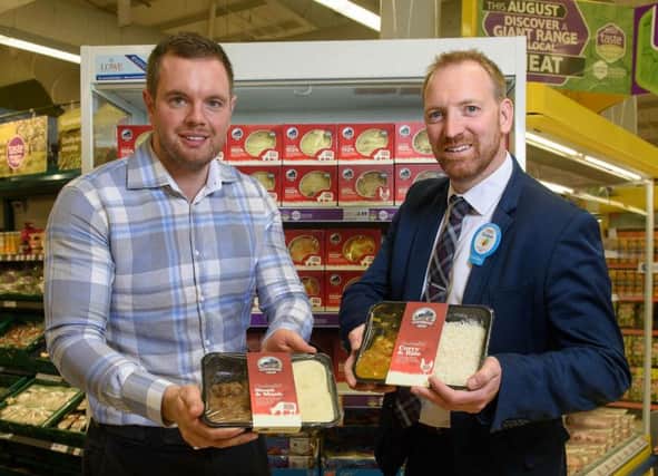 Richard Robinson, Director of Cloughbane Farm Foods with Graham Agnew, Store Manager of Tesco NI store in Dungannon.