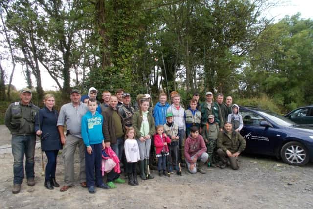Members of the Boyne Valley Fishing Hub enjoying a fishing trip at Courtlough Trout Fishery as part of Inland Fisheries Ireland's Dublin Angling Initiative