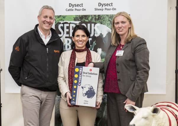 Sophie Bell,  right, Sales Manager with AgriHealth makes the draw for a special prize at the Open Day assisted by Raymond Irvine and Aurelie Moralis, Zoetis.