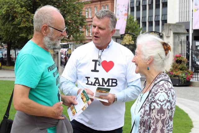 UFU Beef and Lamb vice chair and County Down farmer Sam Chesney speaking with members of the public about locally produced lamb and its versatility.
