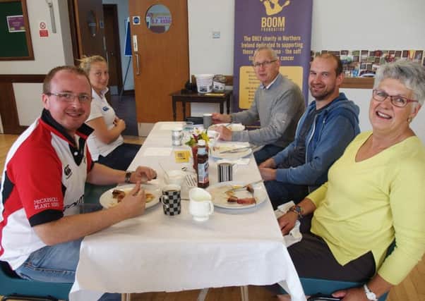 Friends of Kilraughts YFC pop in for a bite to eat during the club's big breakfast and car wash in aid if the Boom Foundation
