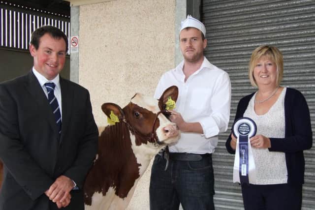 Reserve Shorthorn champion was Kilsally Duchess 17 shown by Andrew Booth, Stewartstown. Included are judge David Christophers, Cornwall; and sponsor Maureen Currie, Danske Bank. Picture: Julie Hazelton