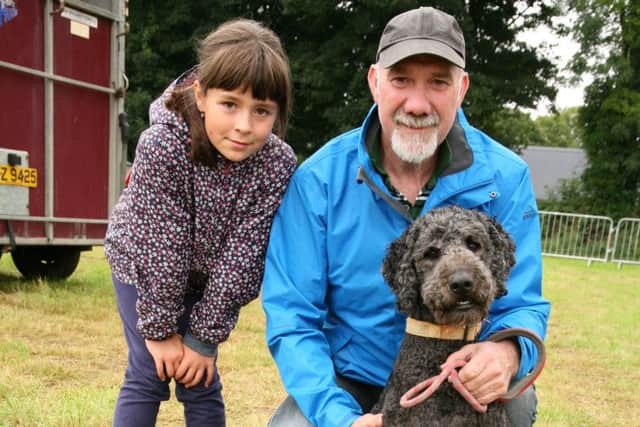 David Torrens, Garvagh, and Clara Patterson with three year old Labradoodle