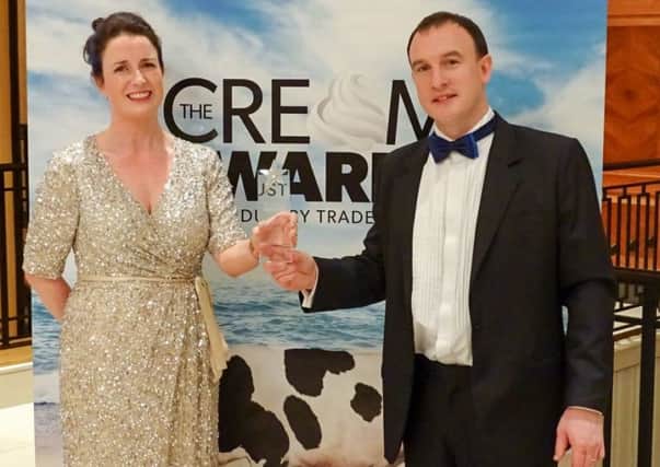 Dairymaster duo Kerry lady Lisa Herlihy, Marketing Manager & Tipperary man Ted McGrath, UK Sales Manager with the prestigious Cream Innovation 2016 award